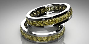 A set of yellow sapphire and platinum wedding bands