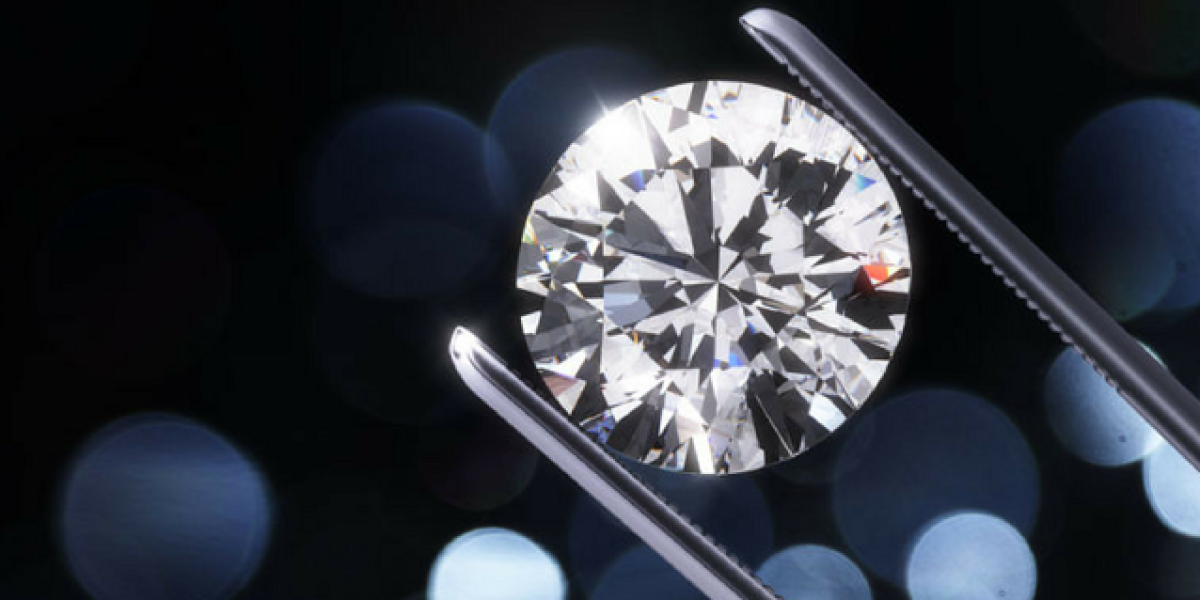 A sparkling, precision cut diamond being held by a diamond specialist's tweezers